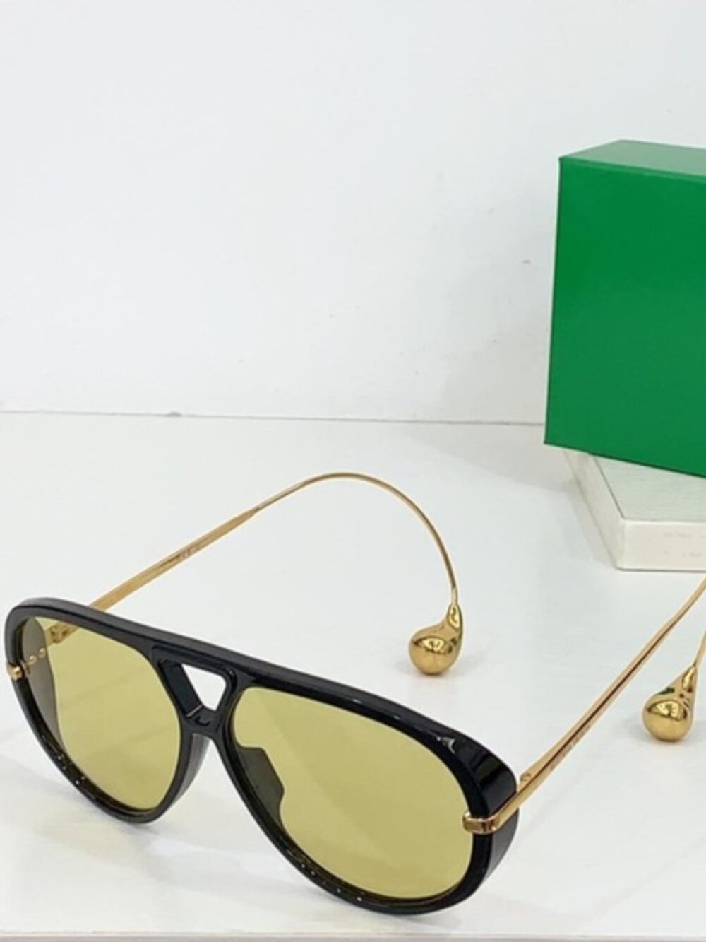 Bottega Veneta Black and Gold Sunglasses